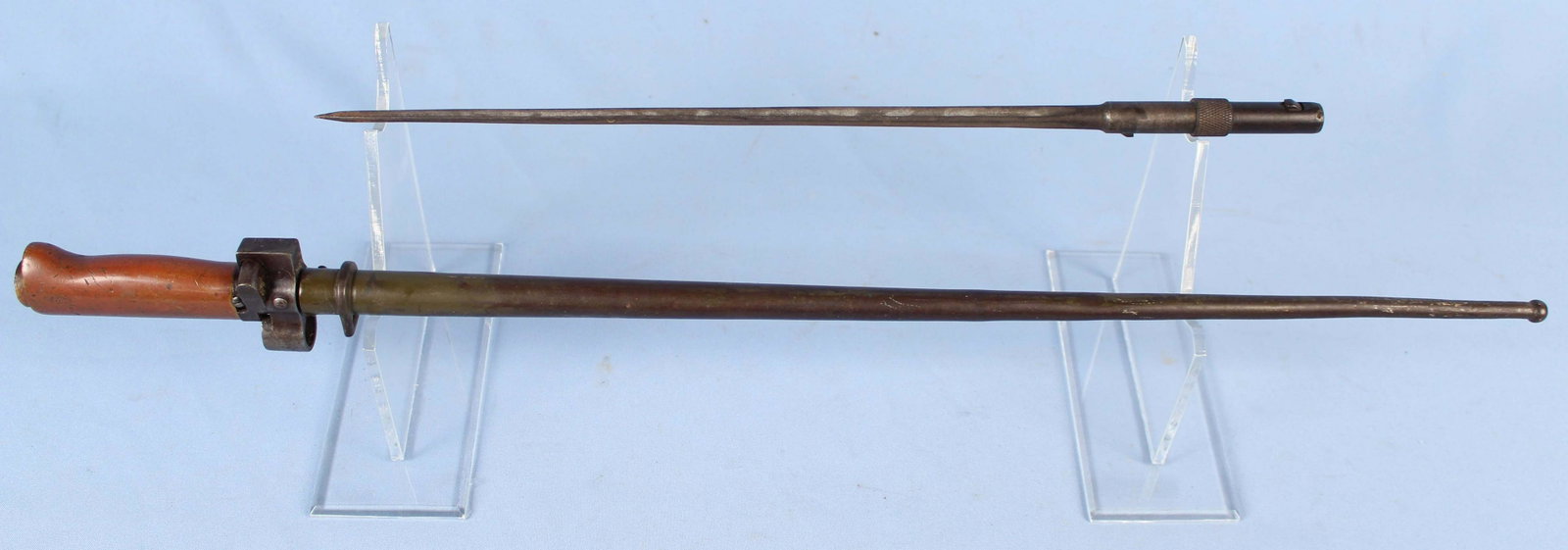 French Model 1866 Cruciform Blade Lebel Bayonet: French Model 1866 Cruciform Blade Lebel Bayonet with Scabbard. Bayonet is marked, "23567." Blade measures 20 1/4" long.(1) Also included is an extra bayonet cruciform blade of unknown model and make t