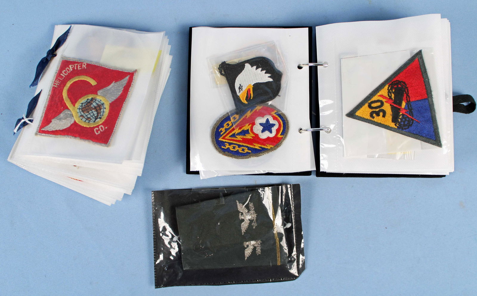 58 US Military Patches and Soldier Photos: 58 US Military Patches and Soldier Photos. (1) USAF blue with star and wings, (2) Sword and Wing patches. (1) US cold war Vietnam 6th Helicopter Co. patch. (1) WWII US Army Pacific Command patch. (1)