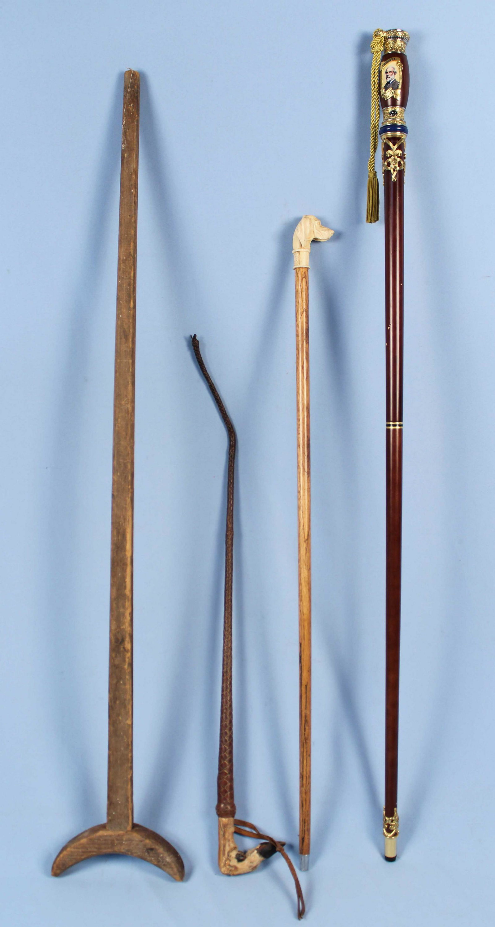 Group of Walking Sticks, Crop, & Civil War Crutch: Group of Walking Sticks, Crop, and Civil War Crutch. (1) Franklin Mint Limited Edition Robert E. Lee Walking Stick. Measures approx. 46" long. (1) Leather riding crop circa 1920 with deer foot handle.