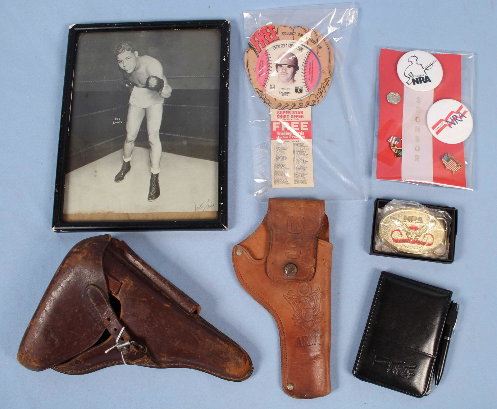 P38 Holster, Joe Louis Photo, NRA Items, Etc: P38 Holster, Joe Louis Photo, NRA Items, Etc. (1) German P38 leather holster. (1) US Hubley Model 1911 cap gun leather holster. (1) Original Joe Louis 1930s promotional photograph (We do not believe t