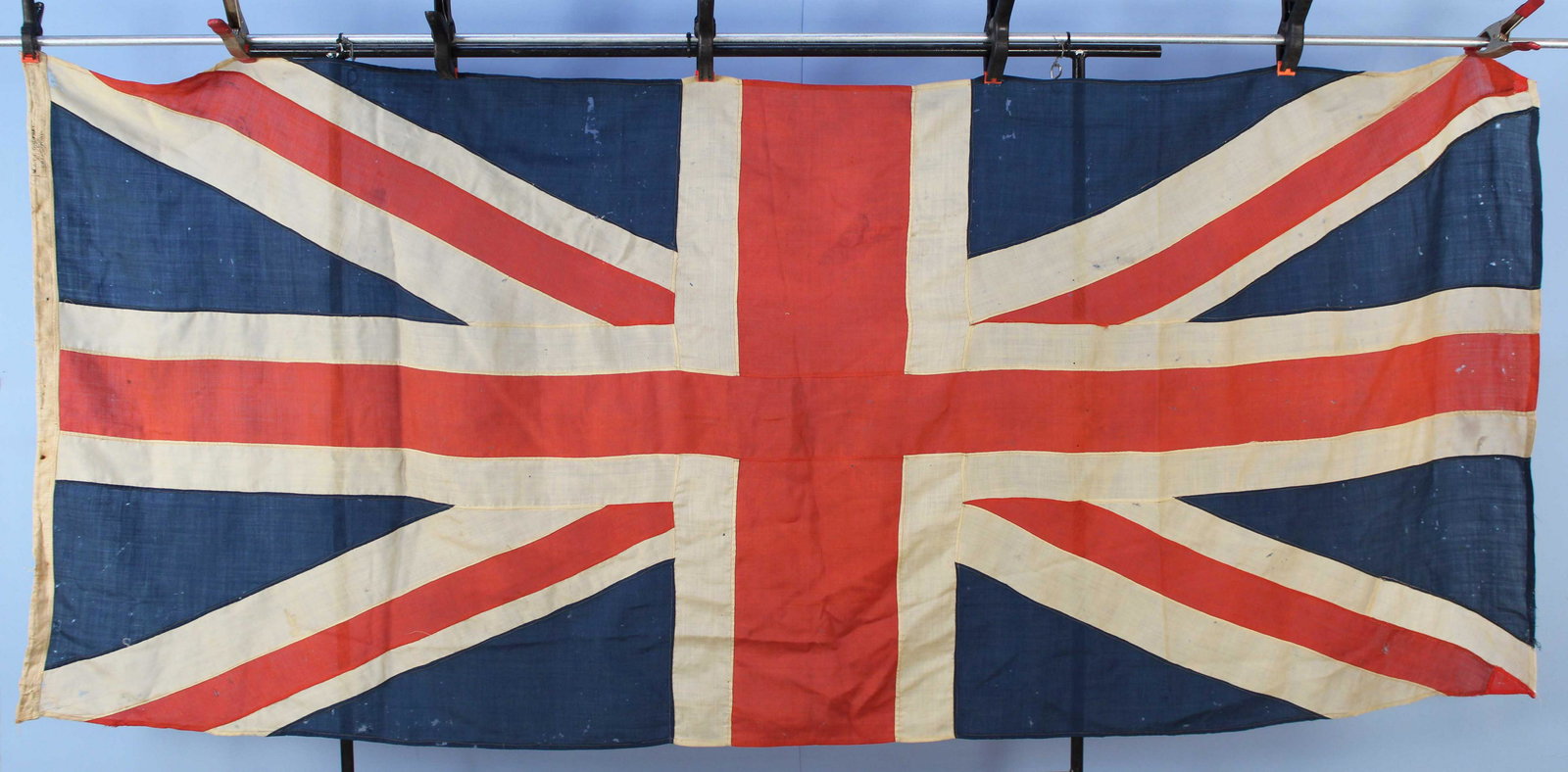 WWI Era British Union Jack Flag 9 Ft. Long: WWI Era British Union Jack Flag. Measures approx 108" X 44". Condition - The flag gas a multitude of holes and some edge loss. The damage was most likely a past insect damage.