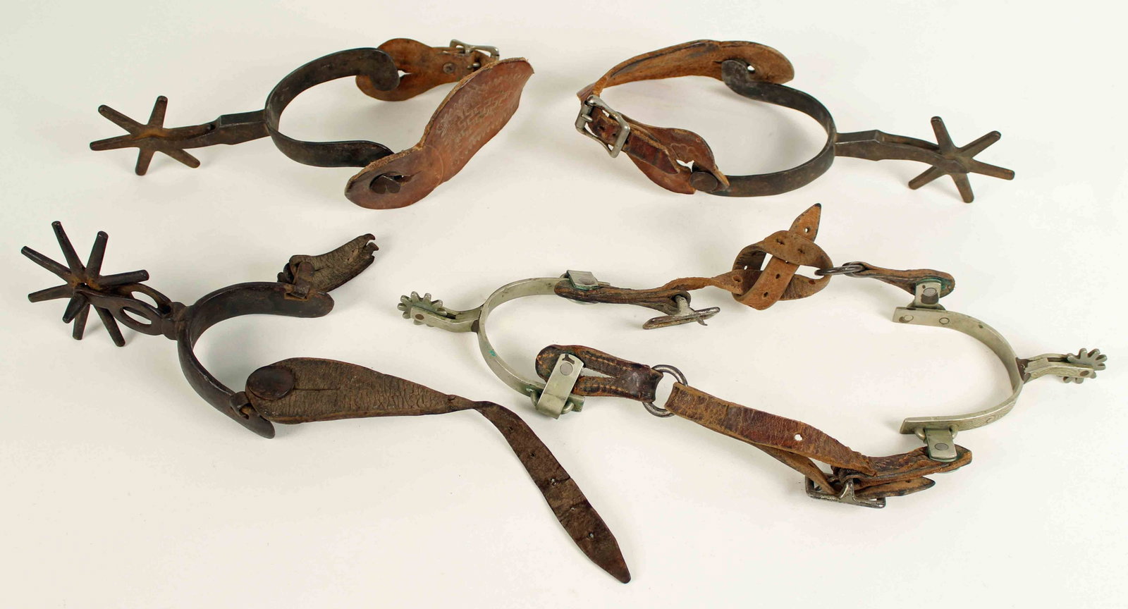 5 Spurs, Pair Ricardo Nickel Silver & Mexican: 5 Spurs, Pair Ricardo Nickel Silver & Mexican (1) Pair of marked "Ricardo Nickel Silver" spurs. (1) Pair of antique Mexican spurs. (1) Odd Mexican spur. Condition - Spurs have wear and some rust. All 