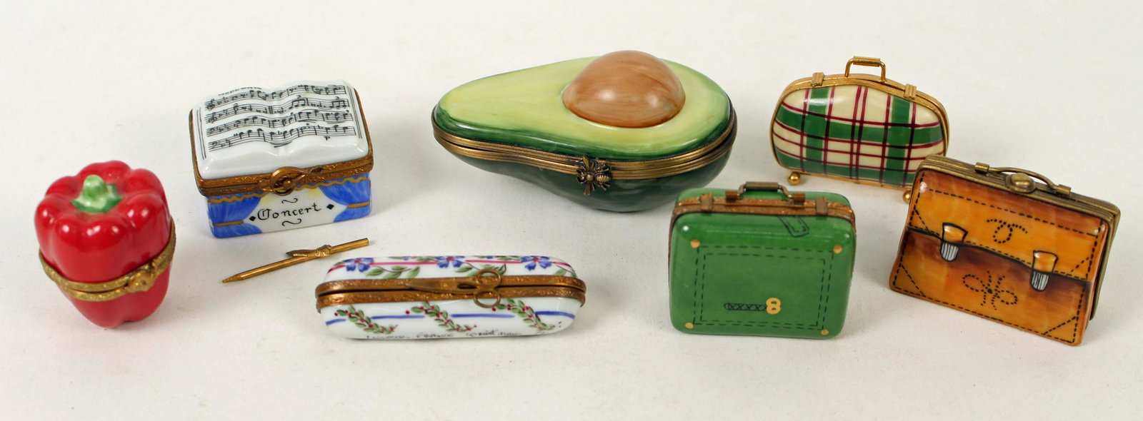 7 Peint Main Limoges Boxes, Suitcases, Etc.: 7 Peint Main Limoges Boxes, Suitcases, Etc. (1) Leather briefcase box. (1) Plaid travel case. (1) Green suitcase. (1) Needle trinket box. (1) Concerto Moderato box. (1) Red bell pepper. Measures 1 1/2