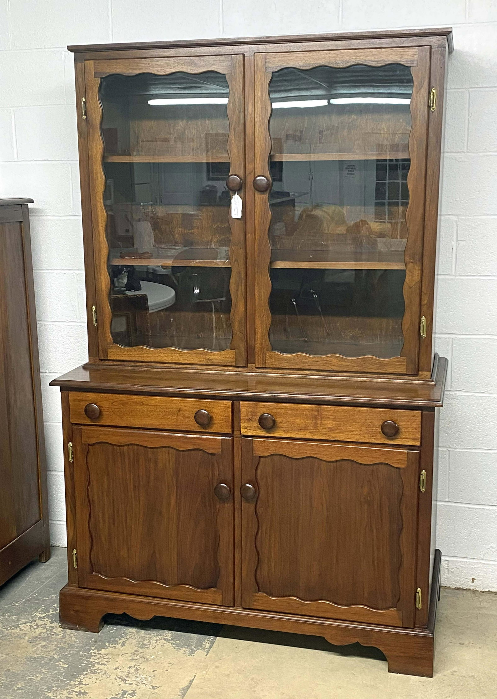 Walnut Two Piece Breakfront Cabinet: Walnut Two Piece Custom Built Breakfront Cabinet. Measures 74 1/4" high x 48" wide x 24" deep. Condition- Breakfront is in overall good condition. See photos.