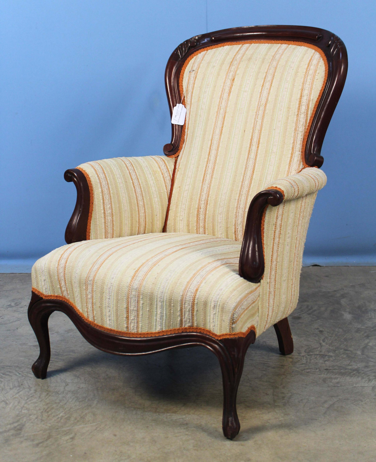 19th C. Walnut Balloon Back Armchair: 19th C. Walnut Balloon Back Armchair with Striped Upholstery. Measures 39" high x 27" wide x 34 1/4" deep. Condition- Armchair is in overall good condition. See photos.
