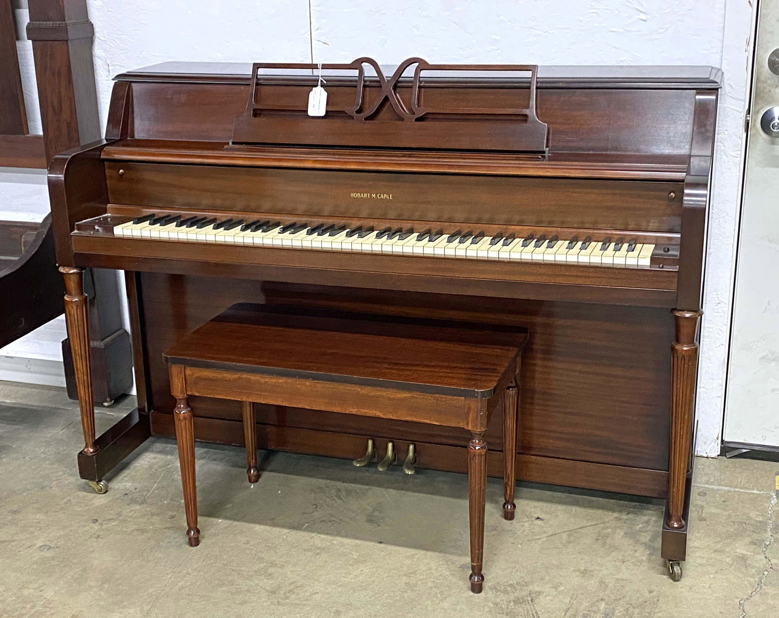 Mahogany Hobart M. Cable Spinet Piano: Mahogany Hobart M. Cable Spinet Piano. Measures 40 1/4" high x 57 3/4" wide x 23 3/8" deep. Condition- Piano is in overall good condition. See photos.