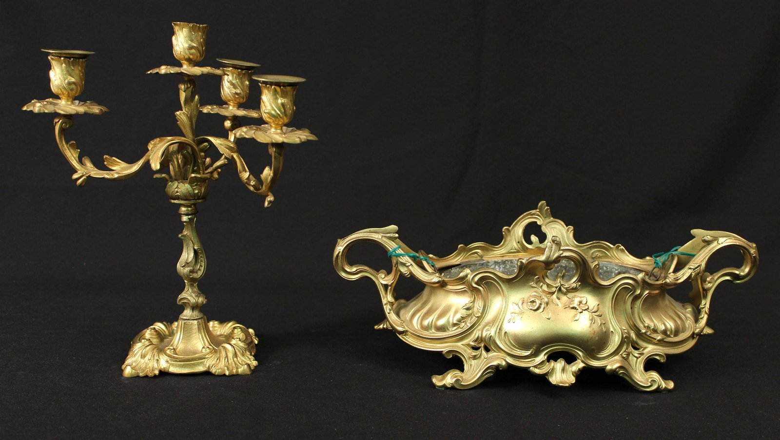 Rococo Candelabra and Art Nouveau Jardiniere: (1) Rococo gilt bronze four light candelabra. Measures 11 1/2" high x 9 1/2" dia. (1) Rococo planter with insert. Marked, "Depose 303." Measures 7" wide x 14 1/2" long. (1) Antique French Art Nouveau