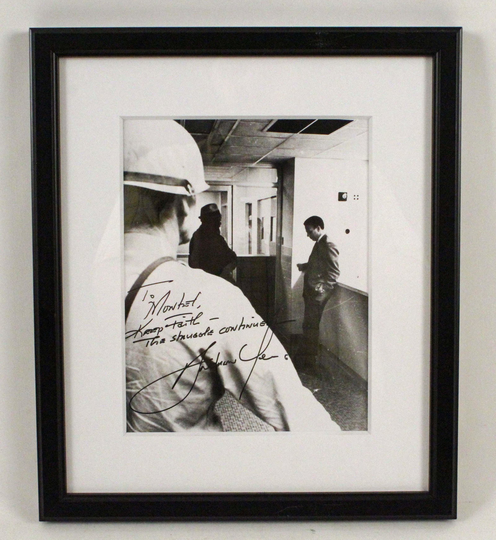 Ambassador Andrew Young Signed Photograph: Ambassador Andrew Young Signed Black & White Photograph. This photo is a photo of the Ambassador on April 4, 1968. Young was a Southern Christian Leadership Conference aide to Dr. Martin Luther King. 