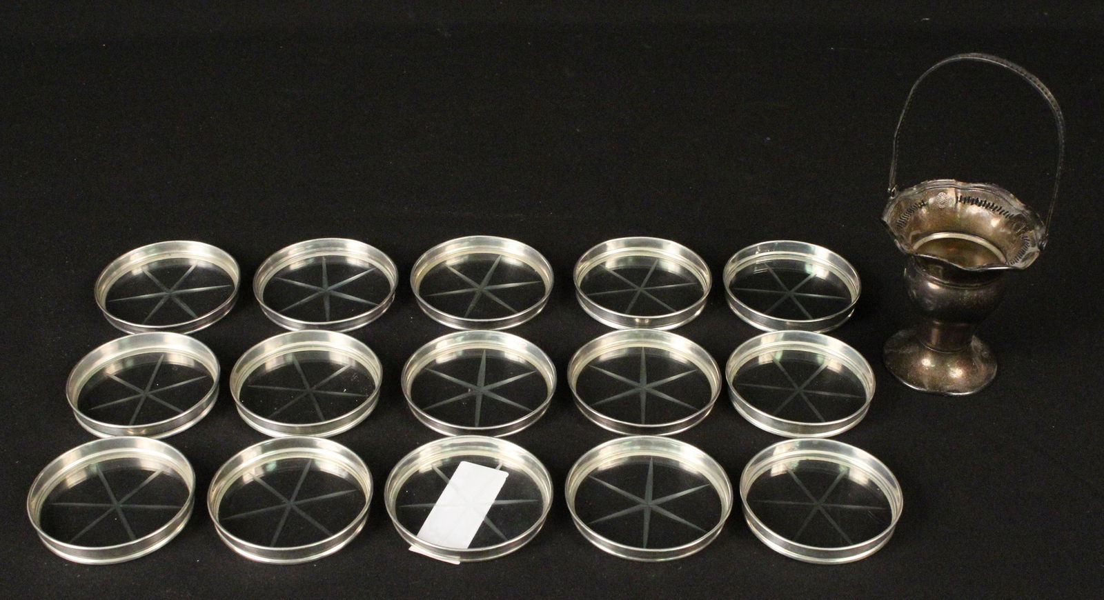 Sterling Silver Basket and 15 Coasters w/ Etched G: Sterling Silver Basket and 15 Coasters with Etched Glass. Coasters are 3" Dia and basket measures 7 1/4" to top of handle. Condition - Coasters are in good condition and basket needs polish.
