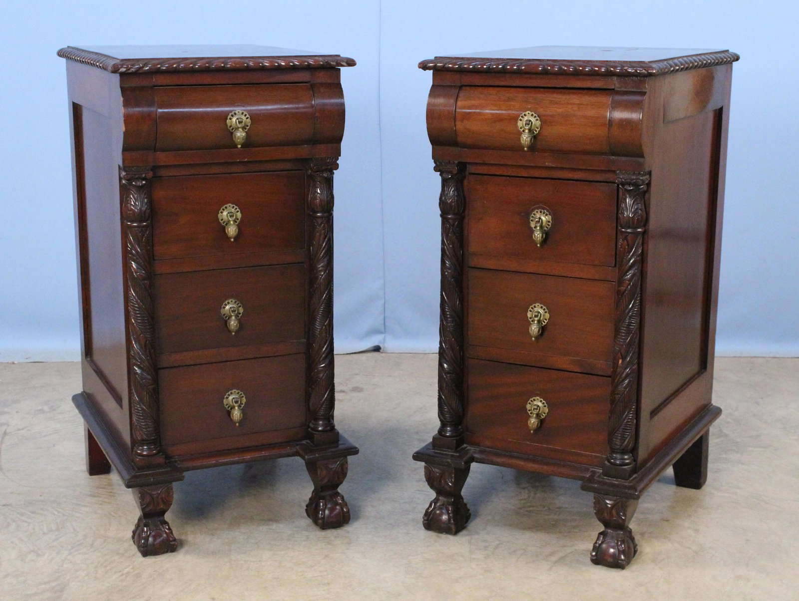 Pair of Acanthus Carved Mahogany Nightstands: Pair of Acanthus Carved Mahogany Nightstands with Carved Columns and Chippendale Feet. Each Circa 1900 nightstand has four drawers with teardrop pulls. The stands measure 31 1/2" high X 15 1/2" Wide X