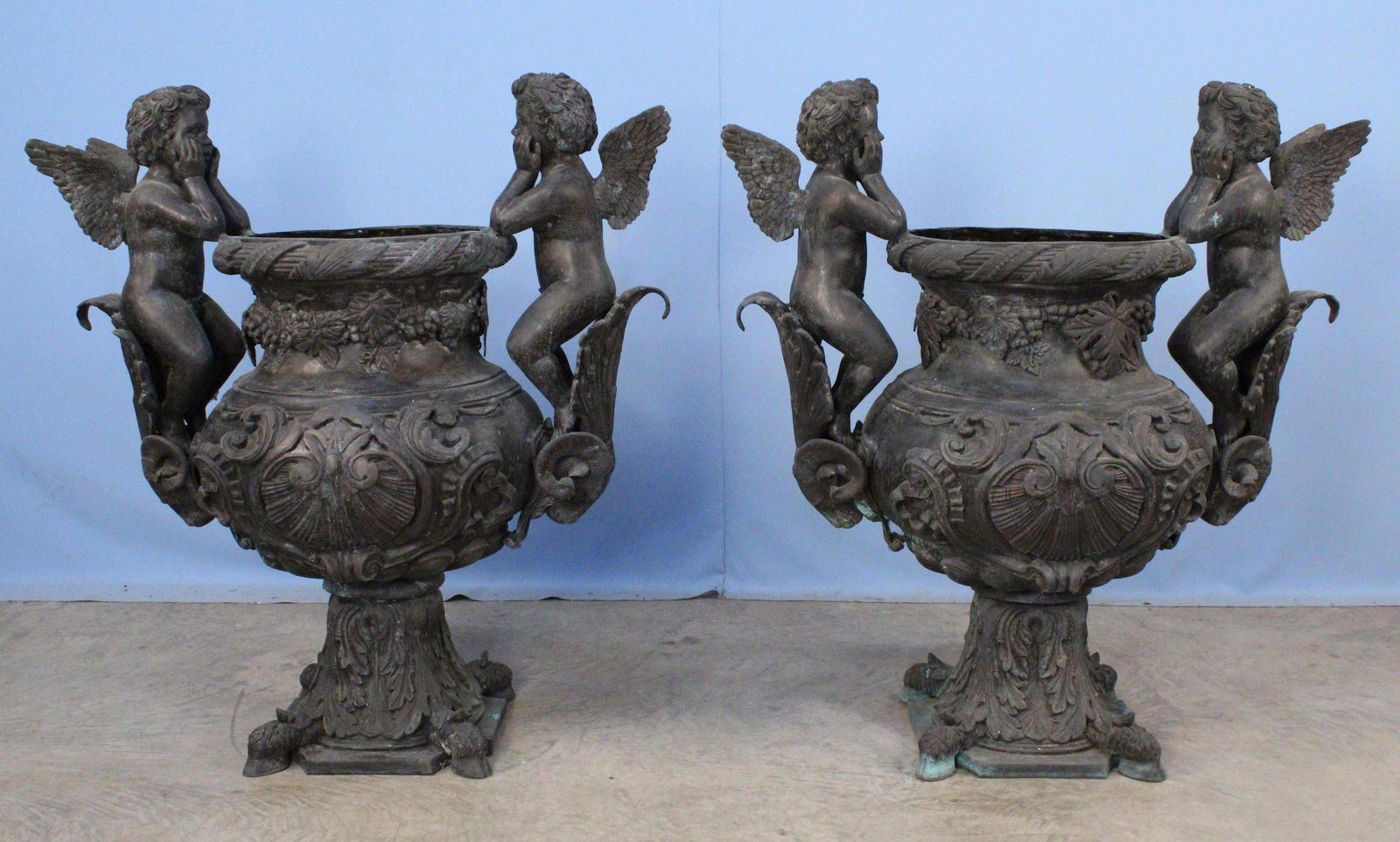 Pair of Resting Cupid Bronze Urns (1 of 9)