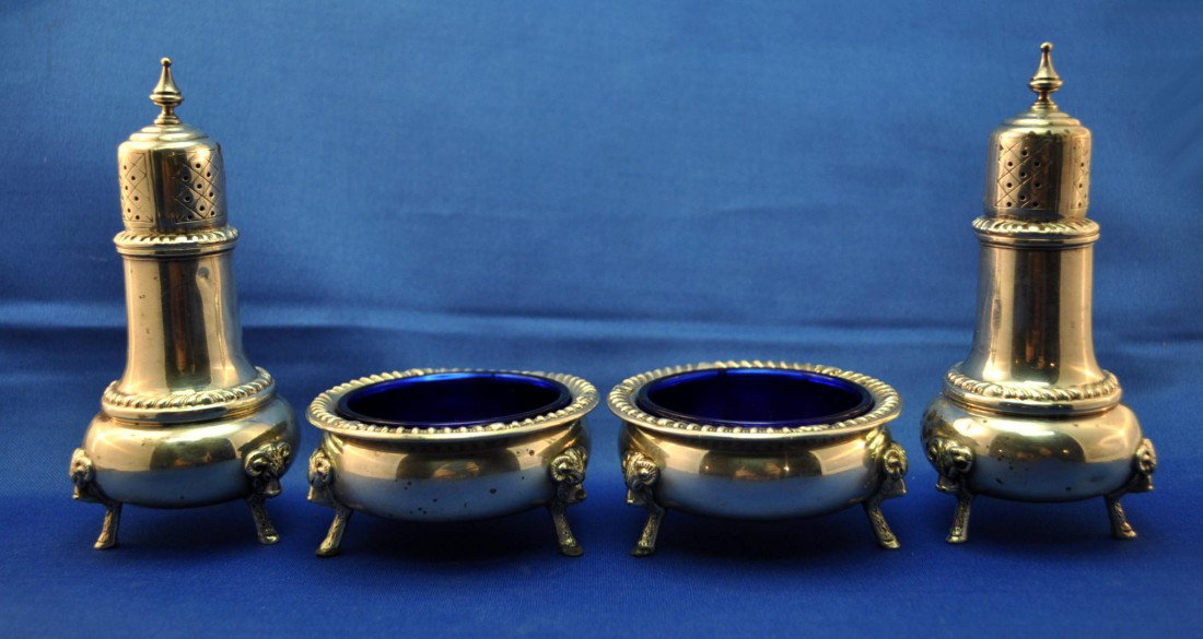 4 Pcs. Sterling Silver: 4 Pcs. Sterling Silver Including Pair of Footed Pepper Shakers and Pair of Footed Salt Cellars with Cobalt Inserts.