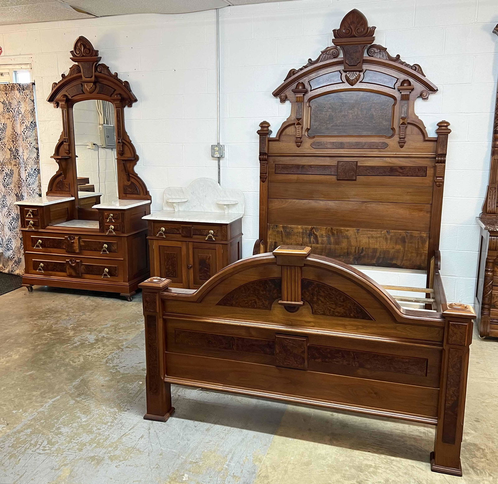 Victorian Walnut Marble Top Bedroom Suite: Victorian Walnut Marble Top Bedroom Suite. (1) Bed measures 89 1/2" high X 59" wide X 82 3/4" long. Mattress measures 54" wide X 77" long. (1) Drop center dresser with six drawers. Measures 88 1/4" hi