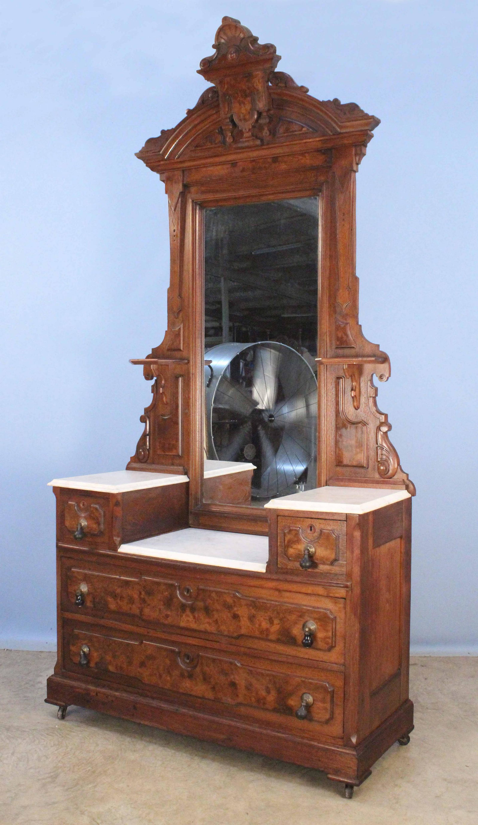 Victorian Renaissance Drop Center M/T Dresser: Victorian Renaissance Drop Center Marble Top Dresser with Four Drawers. Measures 99" high X 49 1/4" wide X 19 1/8" deep. Condition- Dresser is in overall good condition. See photos.