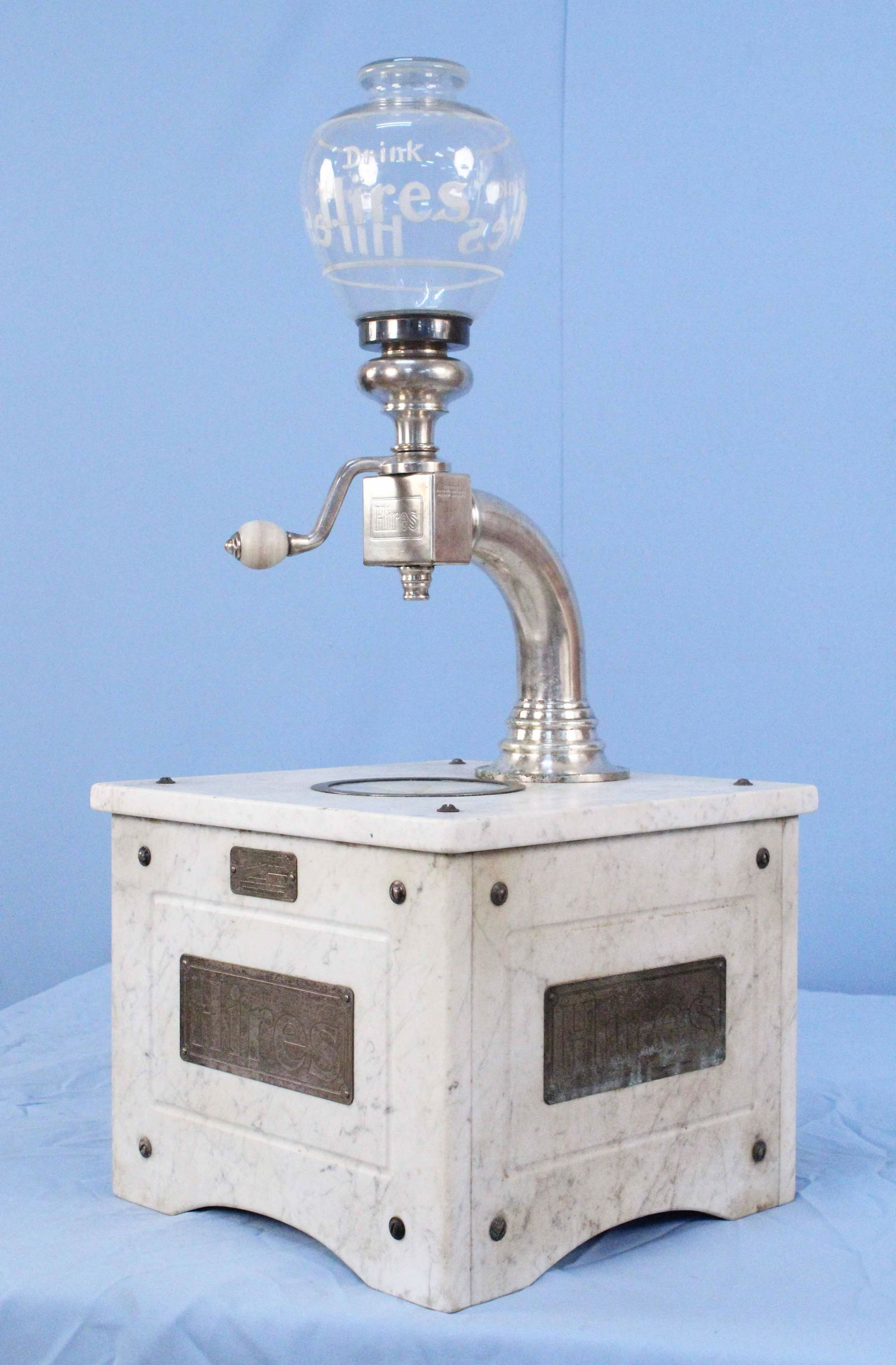 "Hires Root Beer Munimaker" Syrup Dispenser: Hires Root Beer Munimaker Syrup Dispenser Circa 1910. A fine example of this soda fountain countertop syrup dispenser. This dispenser has a very scarce clear glass globe that reads "Drink Hires in rai