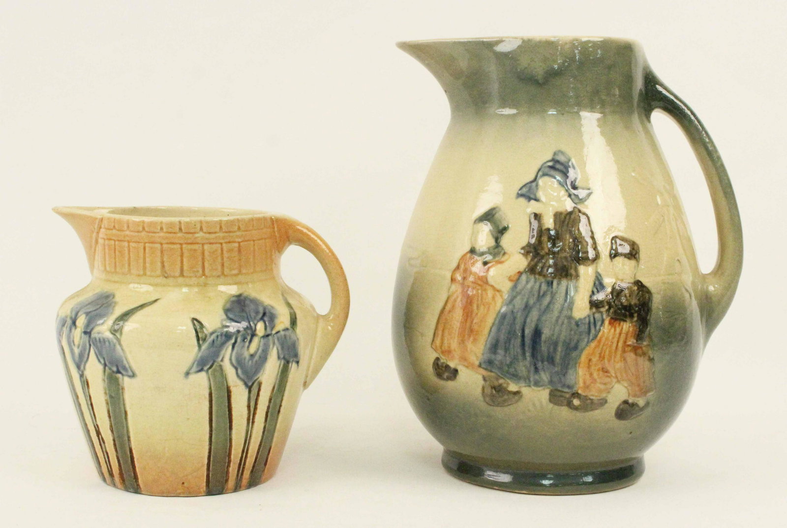 2 Early Roseville Pottery Pitchers Dutch & Iris (1 of 4)