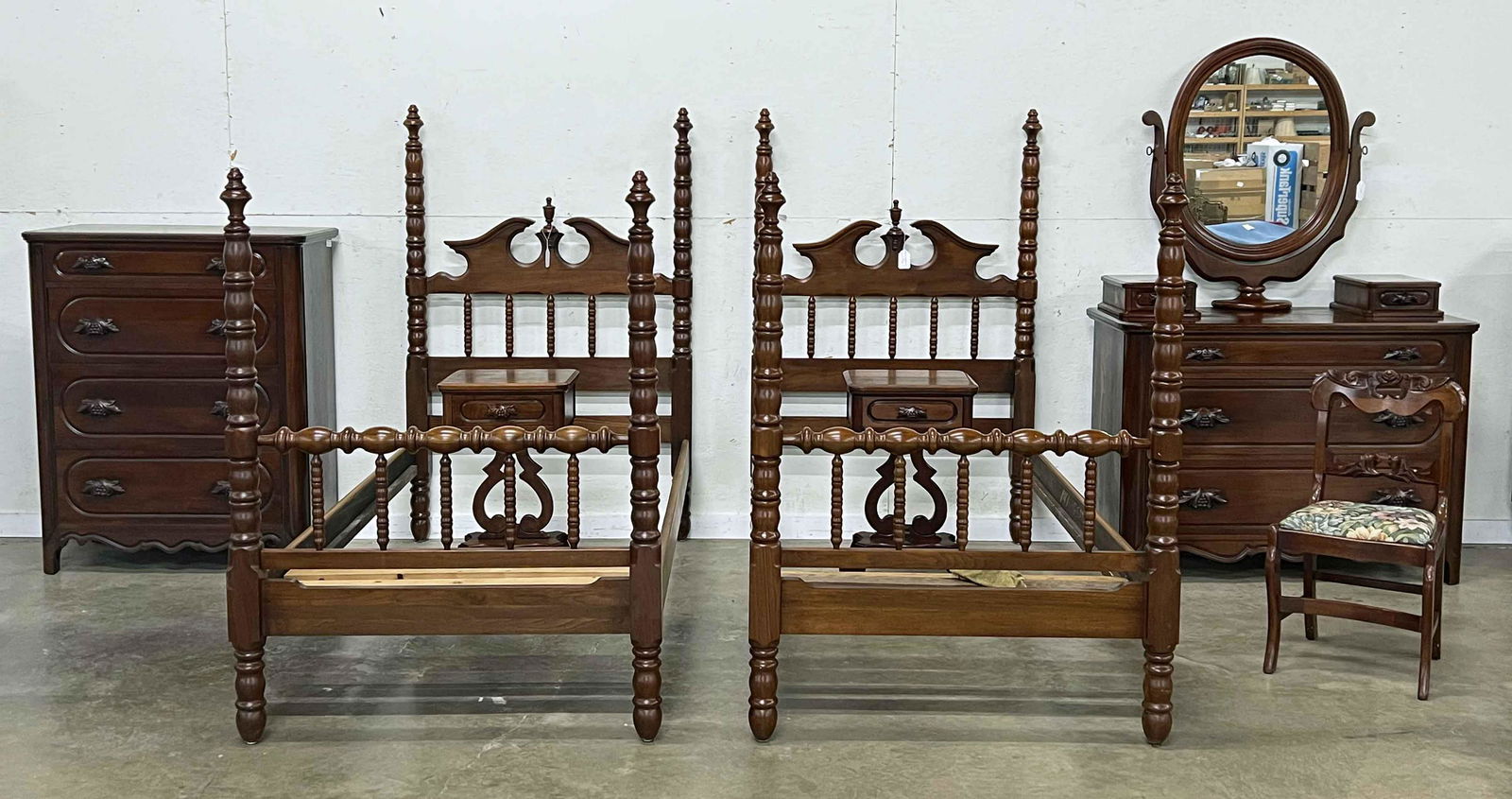 6 Pcs. Lillian Russell Walnut Bedroom Suite: 6 Piece Lillian Russell Walnut Bedroom Suite, Davis Cabinet Company. (2) Twin poster beds, 64 1/8" high X 41 1/2" wide. Accepts twin size mattresses approx. 38" X 75". (1) Chest with four drawers and