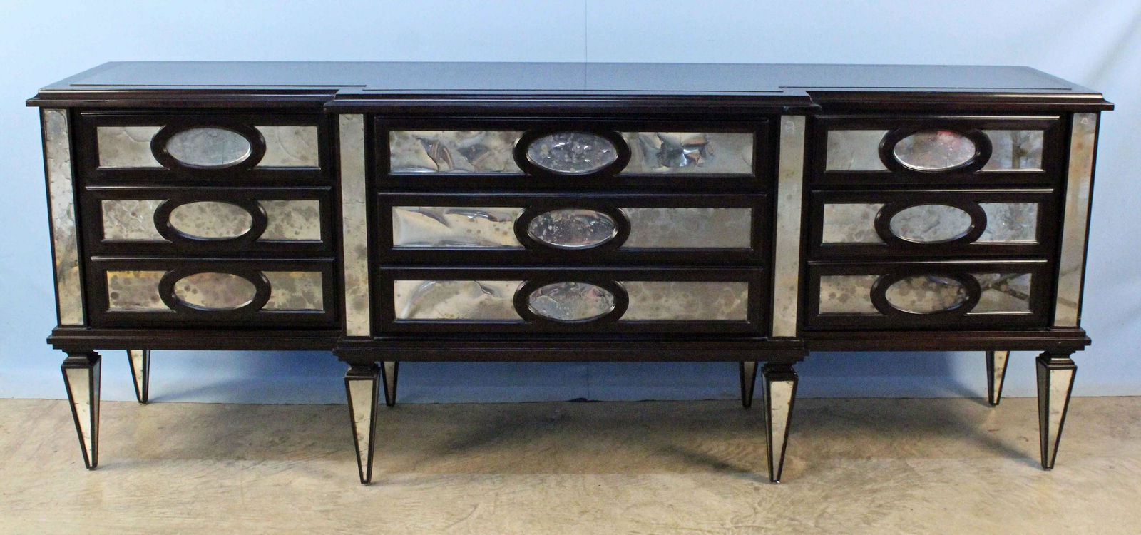 Mirrored Credenza w/ 2 Doors and 3 Drawers: Mirrored Credenza with Two Doors and Three Drawers. Black inlaid black tile top and inverted obelisk legs. Measures 34 1/8" high X 89" long X 21 3/4" deep. Provenance: Waverly Mansion Circa 1852, West