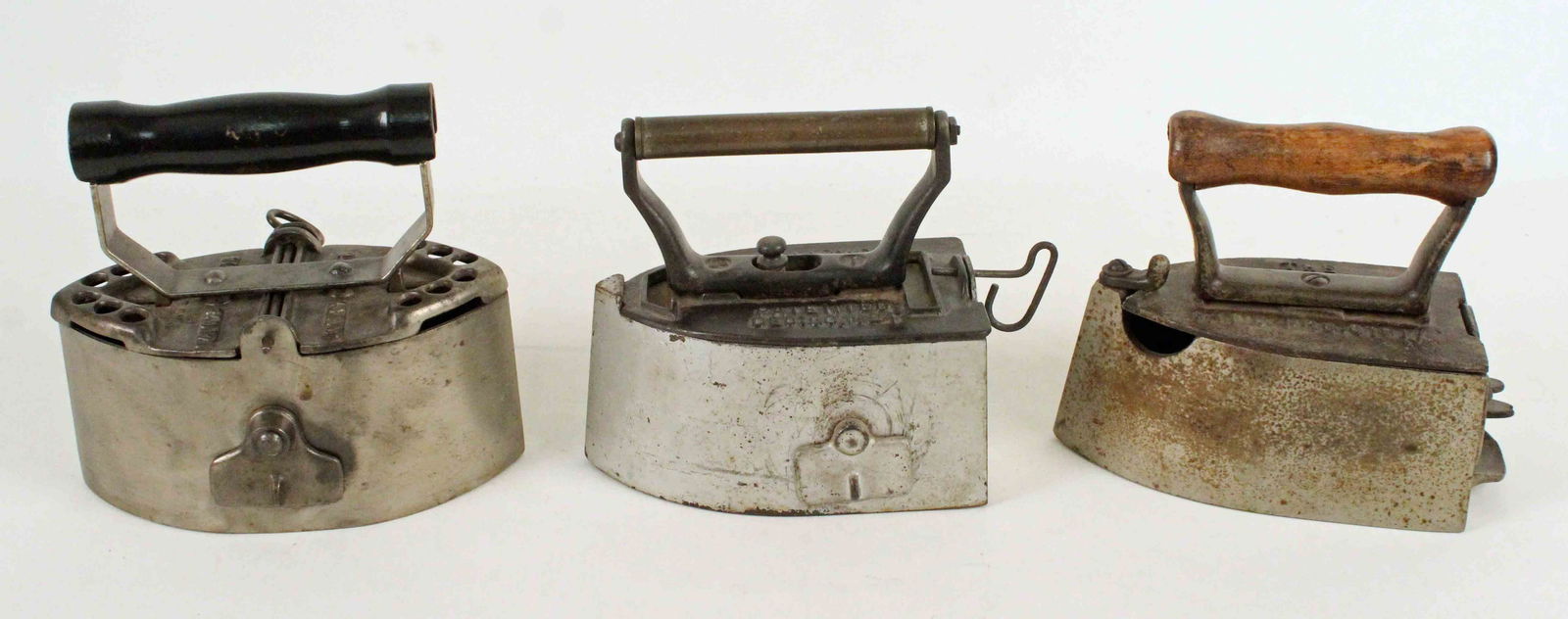 Three 1914-1924 Pat. Charcoal Irons (1 of 5)