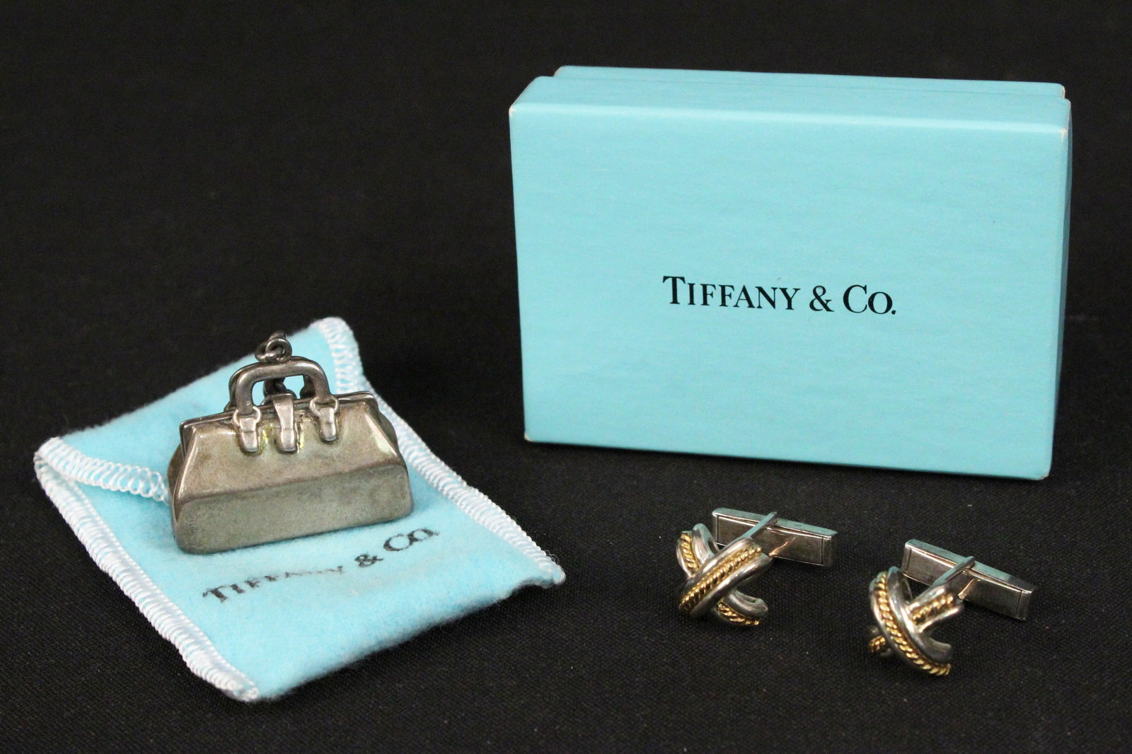 Tiffany Sterling &18K Cufflinks & Sterling Box: Tiffany and Company Sterling &18K Cufflinks & Sterling Pill Box . (1) Pair of Tiffany & Co. sterling silver and 18K gold cuff links. The cuff links are hallmarked, "925" "750" and "Tiffany & Co Copyri