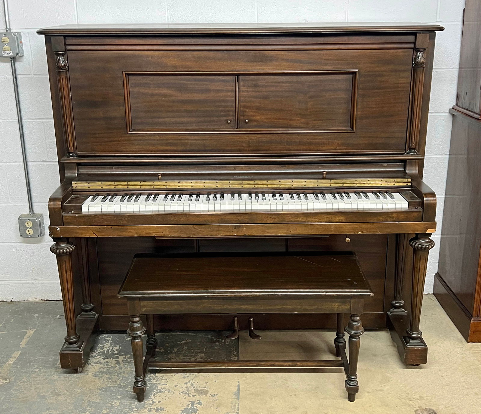 Maynard Player Piano Circa 1920: Circa 1920 Maynard Player Piano. The piano was in working condition at time of inventory and played the musical roll, "Praise the Lord and Pass the Ammunition." Measures 53 1/4" high X 61" wide X 28"