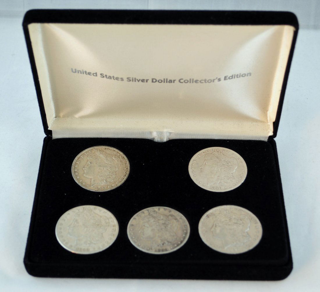 5 Morgan Silver Dollars 1889-1899: 5 Morgan Silver Dollars Including (1)-1889 O; (1)-1890; (1)-1890 O; (2)-1899 O`s.