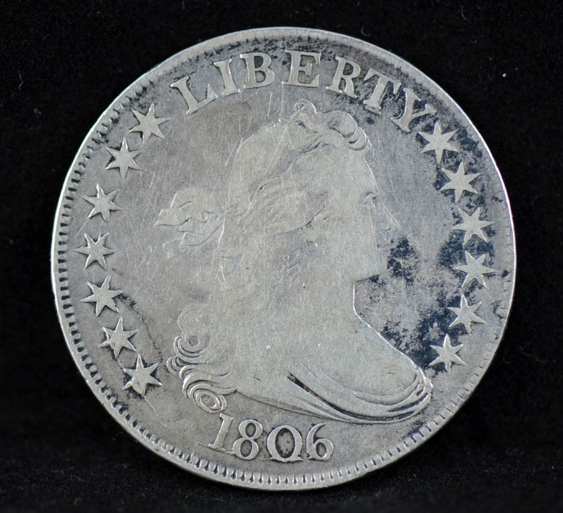 1806 Draped Bust Silver Half Dollar: 1806 Draped Bust Silver Half Dollar and possible error coin. The coin has a raised vein that runs through the bottom part of the date and continues to the left of the date through three stars. This co