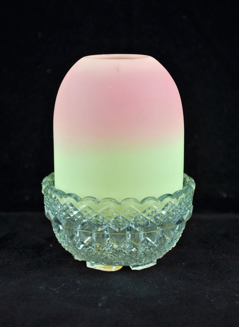 19th Century Burmese Salmon Colored Fairy Lamp: 19th century Burmese salmon colored fairy lamp 3.75" in. tall with clear pressed glass holder marked S. Clarke.