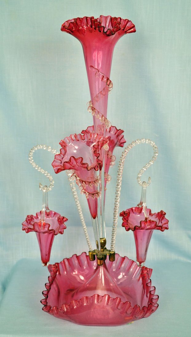 Victorian Cranberry Ruffled Epergne: Victorian Cranberry Ruffled Epergne 24" tall with three lilies and two baskets on ruffled 9" square bowl base.