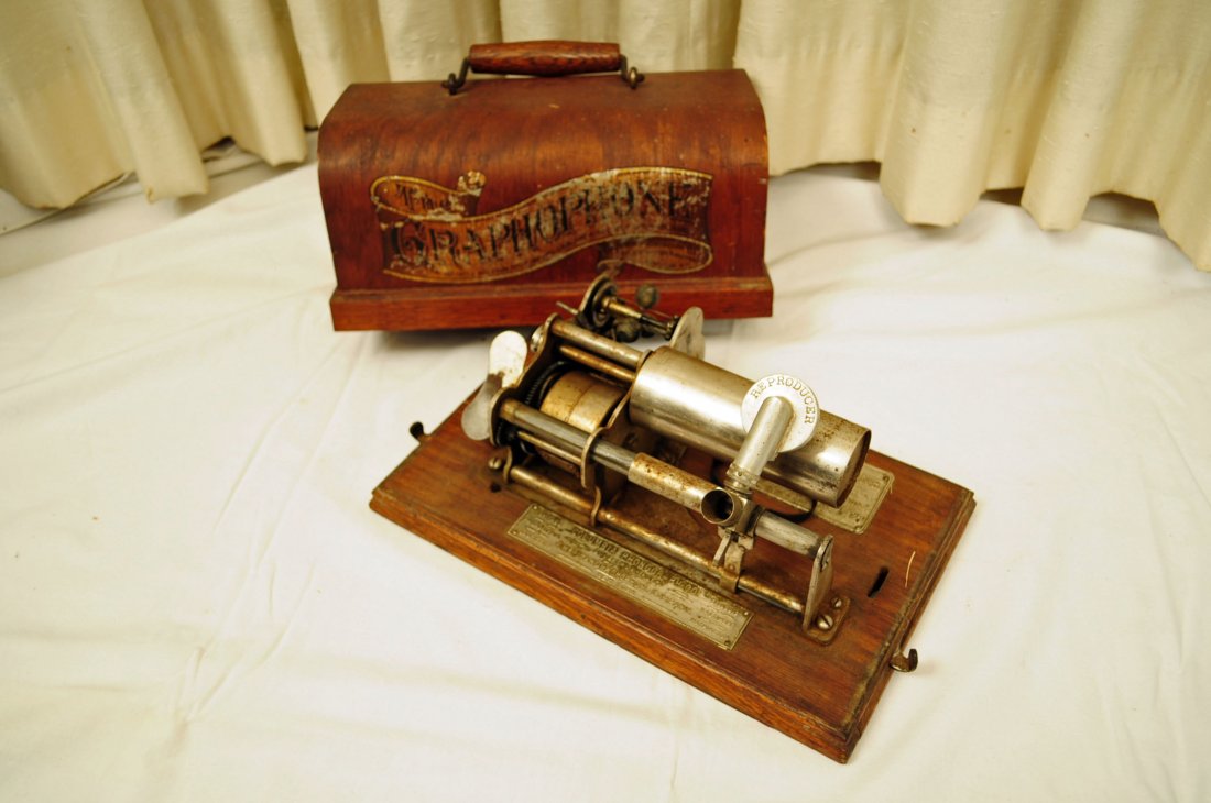 American Type B Graphophone: American Type B graphophone in oak case interior metal tugs are intact. Case measures 6.25" tall X 11.5" length X 7" wide excluding the handle, and has the original decal.