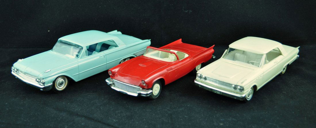 Three Ford Promo Cars 1957, 1961 & 1963: White 1963 Ford Fairlane 500 Hardtop; Blue 1961 Ford GALAXY 500 2-DOOR HARDTOP ; AMT 1957 Ford Thunderbird Friction Promo Model Car in red.