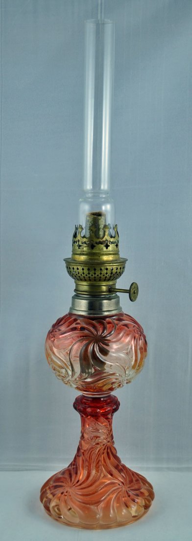 Oil Lamp; Baccarat, Rosette, Amberina, 10.75 inch : A Baccarat Amberina global oil lamp having the Rosette pattern in amberina. Unmarked., 10.75 inch with out chimney. Burner with compass mark.