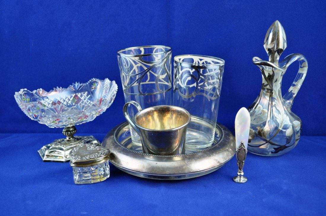 Group of Sterling Silver & Sterling Fitted Items: Items with sterling silver including; champagne coaster; baby cup; small cut glass compote on stand; cut glass ring box with sterling lid; silver overlay vinegar cruet & 2 tumblers; mother pearl and s