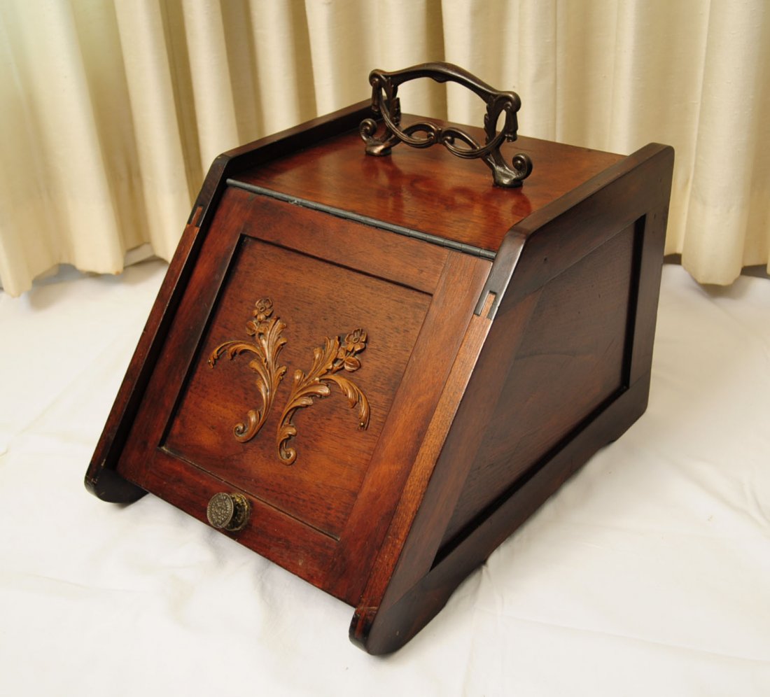 English Walnut Coal Hodge: English walnut coal hodge with cast metal handle, 14" tall X 16.5" deep X 12.5" wide.