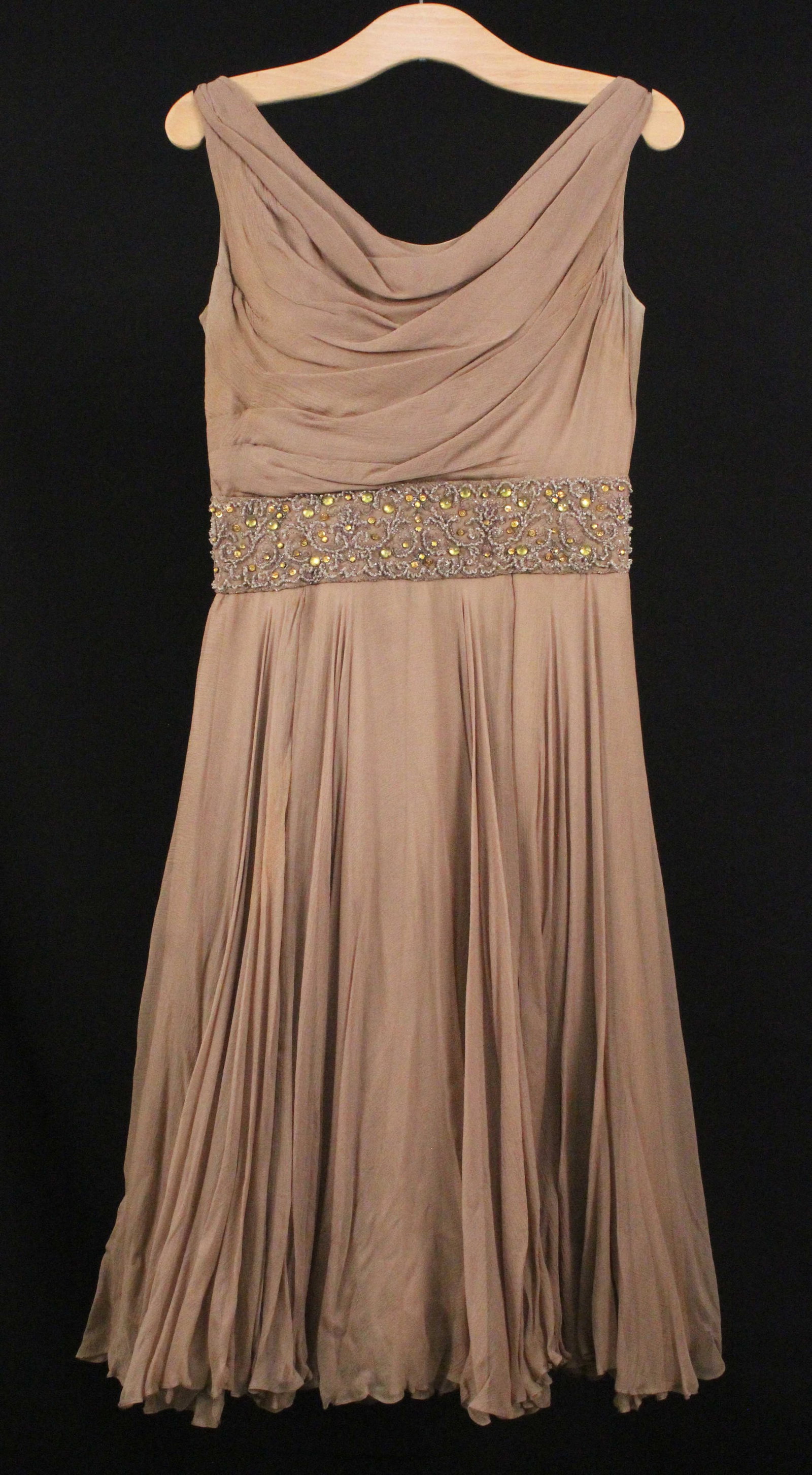 Toast Silk Chiffon Cocktail Dress: Toast Silk Chiffon Cocktail Dress. Nice dress with draped bodice, scoop back, and inset beaded waist detail with 3-layer full chiffon skirt. According to the family of the owner, most of the dresses i