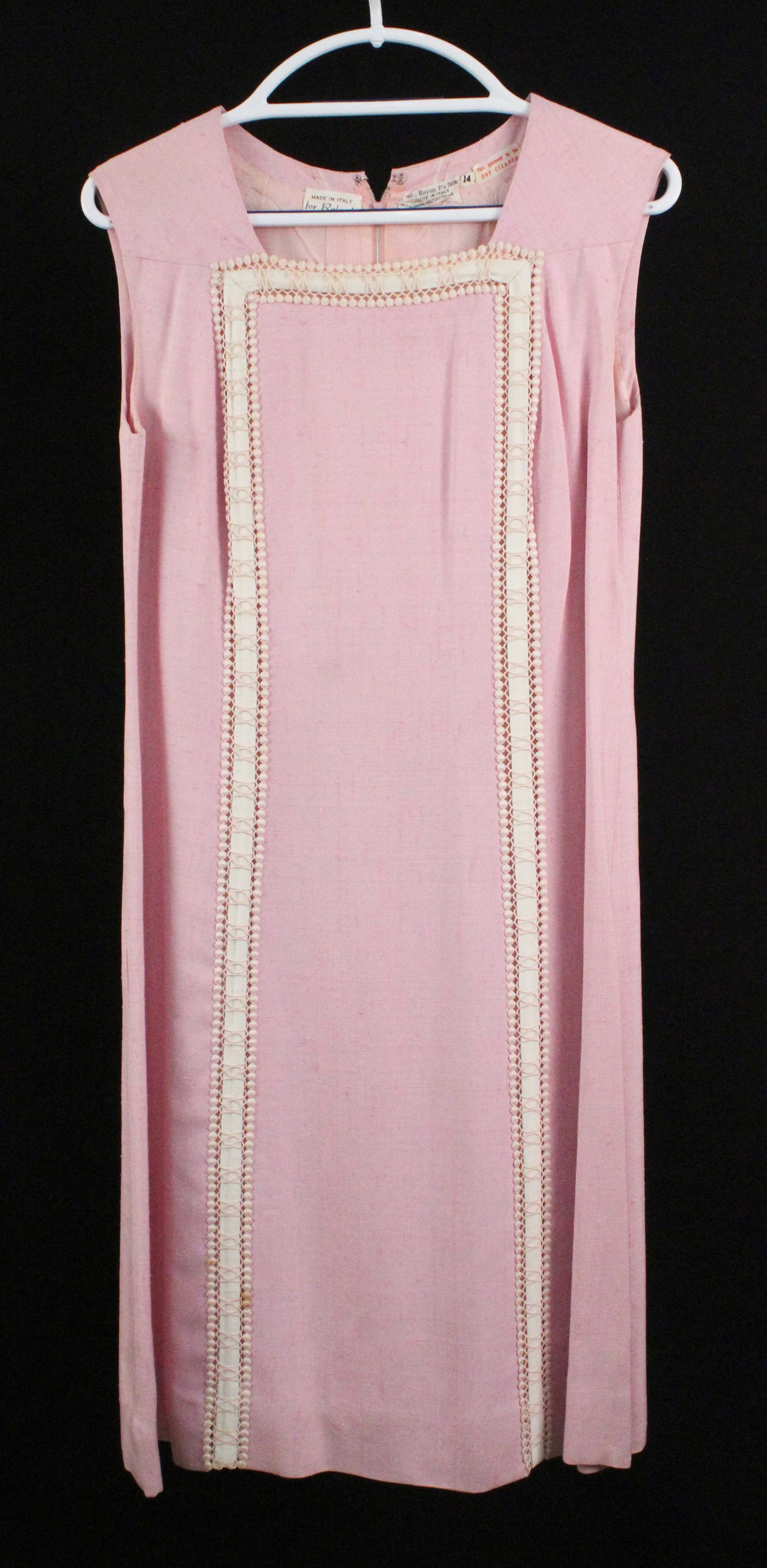 Rolande Pink Sheath Dress w/ Ivory Trim Lace: Rolande Pink Square Neck Sleeveless Sheath Dress with Ivory Trim Lace. Labeled, "Made In Italy for Rolande." Material: 93% Rayon, 7% Silk. Marked, "14." Condition- Front of dress has a stain to trim t