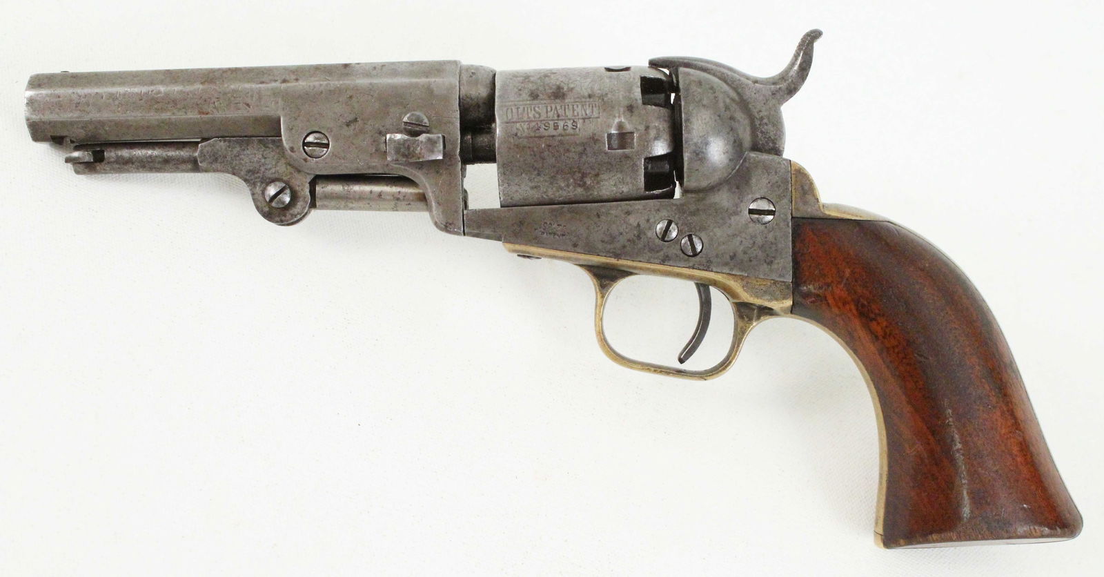 Colt Patent 1849 Pocket Pistol w/ Stagecoach Scene: Colt Patent 1849 .31 Caliber Pocket Pistol with Engraved Stagecoach Robbery Scene On Cylinder. Manufactured in 1852. Serial Number: 49569. All parts have matching serial numbers. Barrel measures 4" lo