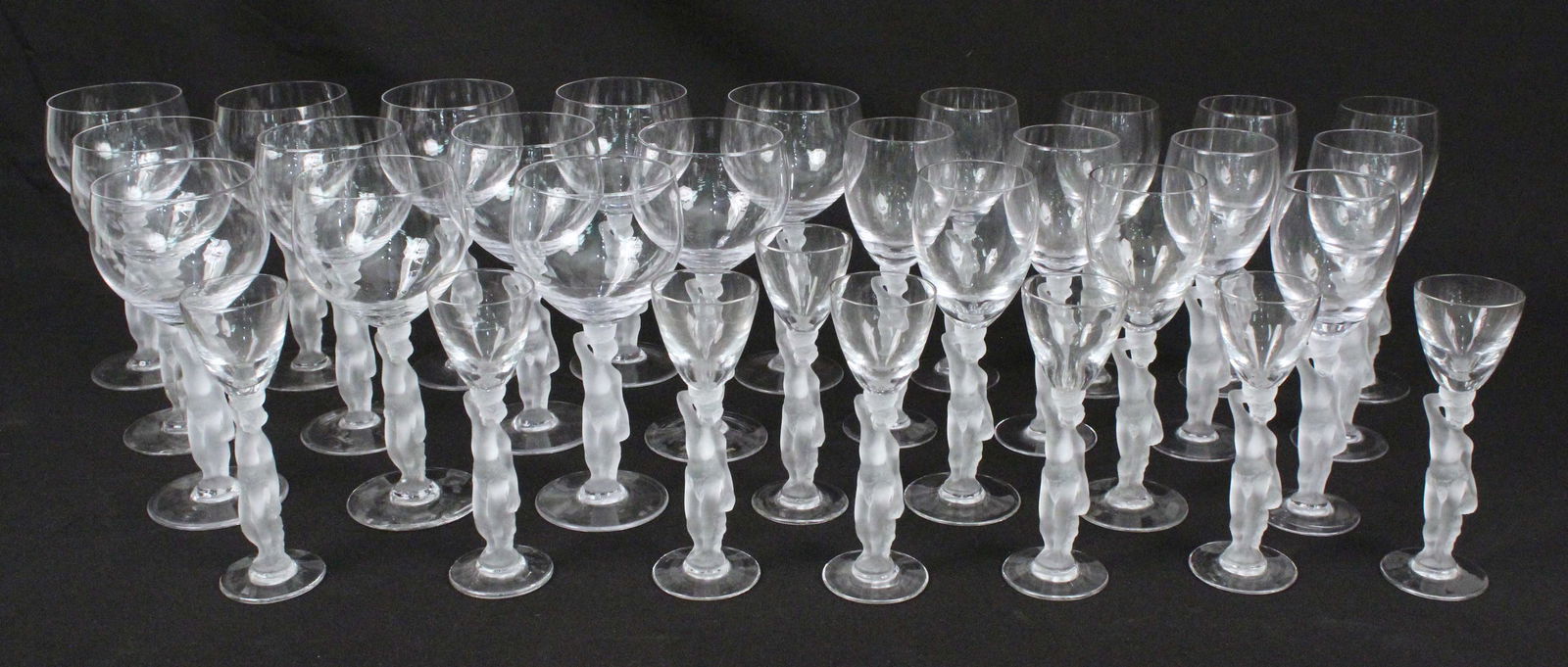 (31) Bayle Bacchante Frosted Nude Stem Crystal: (31) Bayle Bacchante Frosted Nude Stem Crystal Glasses. (12) 10 oz. brandy glasses, 7 1/8" high. (11) 5 oz. wine glasses, 7 3/8" high. (8) Cordials, 6" high. Condition- Good condition. No chips or cra