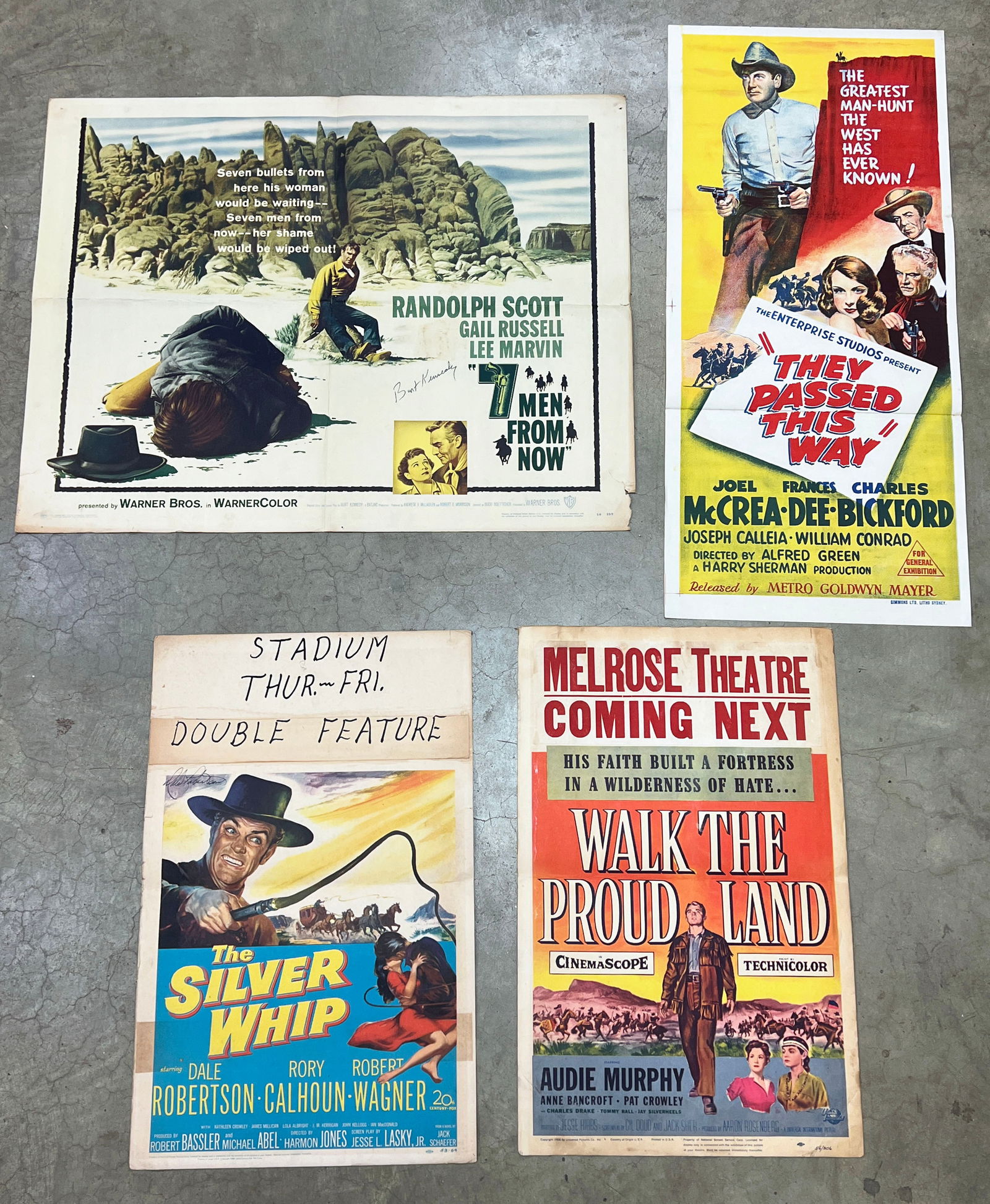 (4) 1950's Western Movie Posters: (1) 1953 "The Silver Whip." Measures 14" X 22". Features Dale Robertson, Rory Calhoun and Robert Wagner. This poster has show dates from local theater hand written on the top portion. Has a crease and