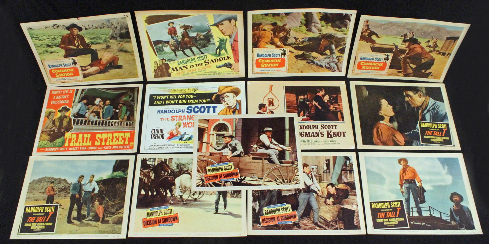 (13) Randolph Scott Lobby Cards: (13) Randolph Scott Lobby Cards, 1940's-1960's. Includes: "The Tall T," "Decision At Sundown," "Hangman's Knot," "Trail Street," "The Stranger Wore A Gun," "Comanche Station," and "Man in the Saddle."
