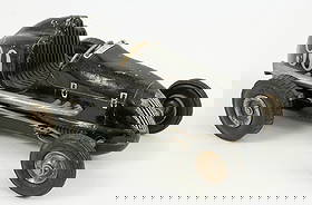 C. 1950 Ohlsson & Rice #90 Tether Race Car: Circa 1950 Ohlsson & Rice #90 Tether Race Car. Die cast metal construction. Measures 3 3/4" high X 5 3/8" wide X 10" long. Provenance the remaining inventory of Antique Archaeology, closed Nashville,