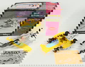 Cox Shrike & Wen-Mac Lotus .049 Engine Powered Car: Cox Shrike & Wen-Mac Lotus .049 Engine Powered Cars. (1) Circa 1970 Cox Shrike Bonneville Special .049 engine powered air car. Plastic body with rubber tires. Comes with the original manual and box. M