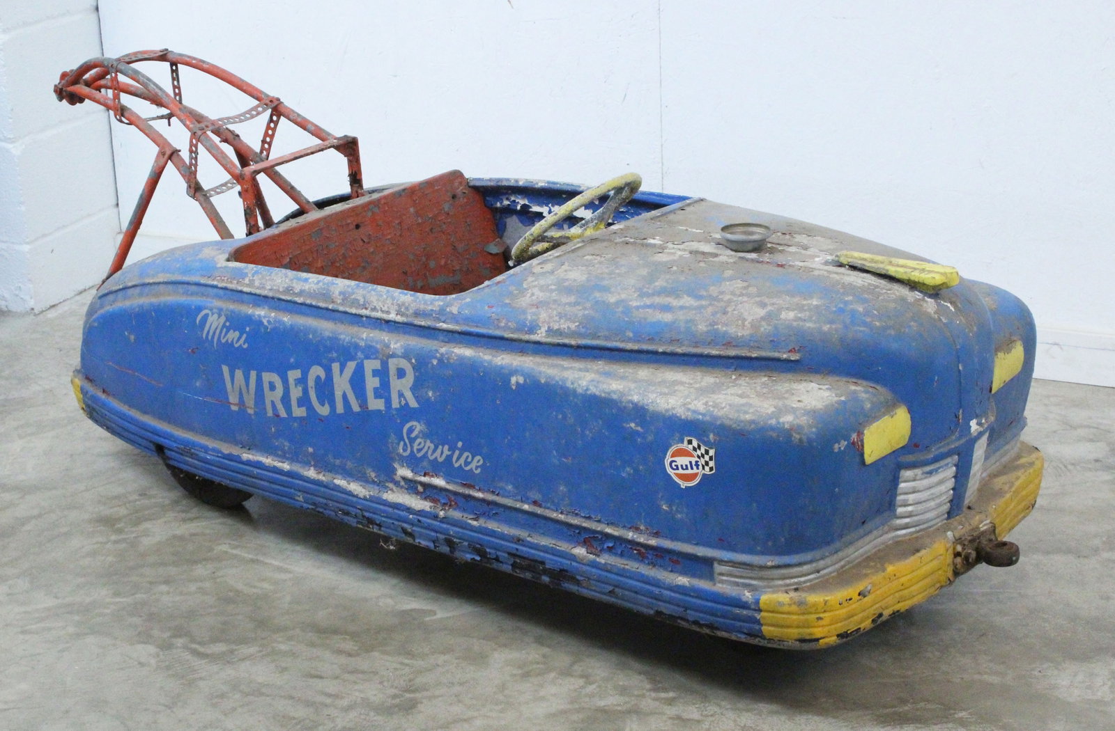 1950's Cast Aluminum Carnival Wrecker: 1950's Cast Aluminum Carnival Wrecker. "Mini Wrecker Service." Measures 25 1/2" high X 24" wide X 69" long. Provenance the remaining inventory of Antique Archaeology, closed Nashville, Tennessee locat