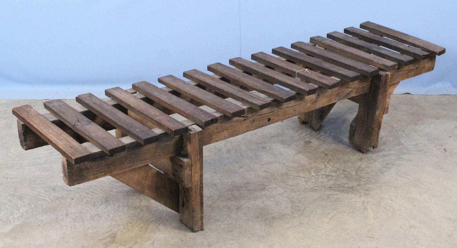 Vintage Wooden Bench/Stand: Vintage Wooden Bench/Stand. Measures 16 1/2" high X 18 3/8" wide X 71 3/4" long. Provenance the remaining inventory of Antique Archaeology, closed Nashville, Tennessee location.