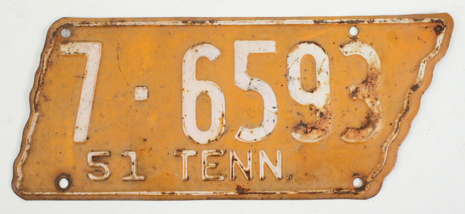 1951 Madison County Tennessee Orange License Plate: 1951 Madison County Tennessee Orange License Plate. Measures 5 1/4" wide X 12 1/4" long. ***THIS LOT IS NOT BEING SOLD FOR ANTIQUE ARCHEOLOGY***