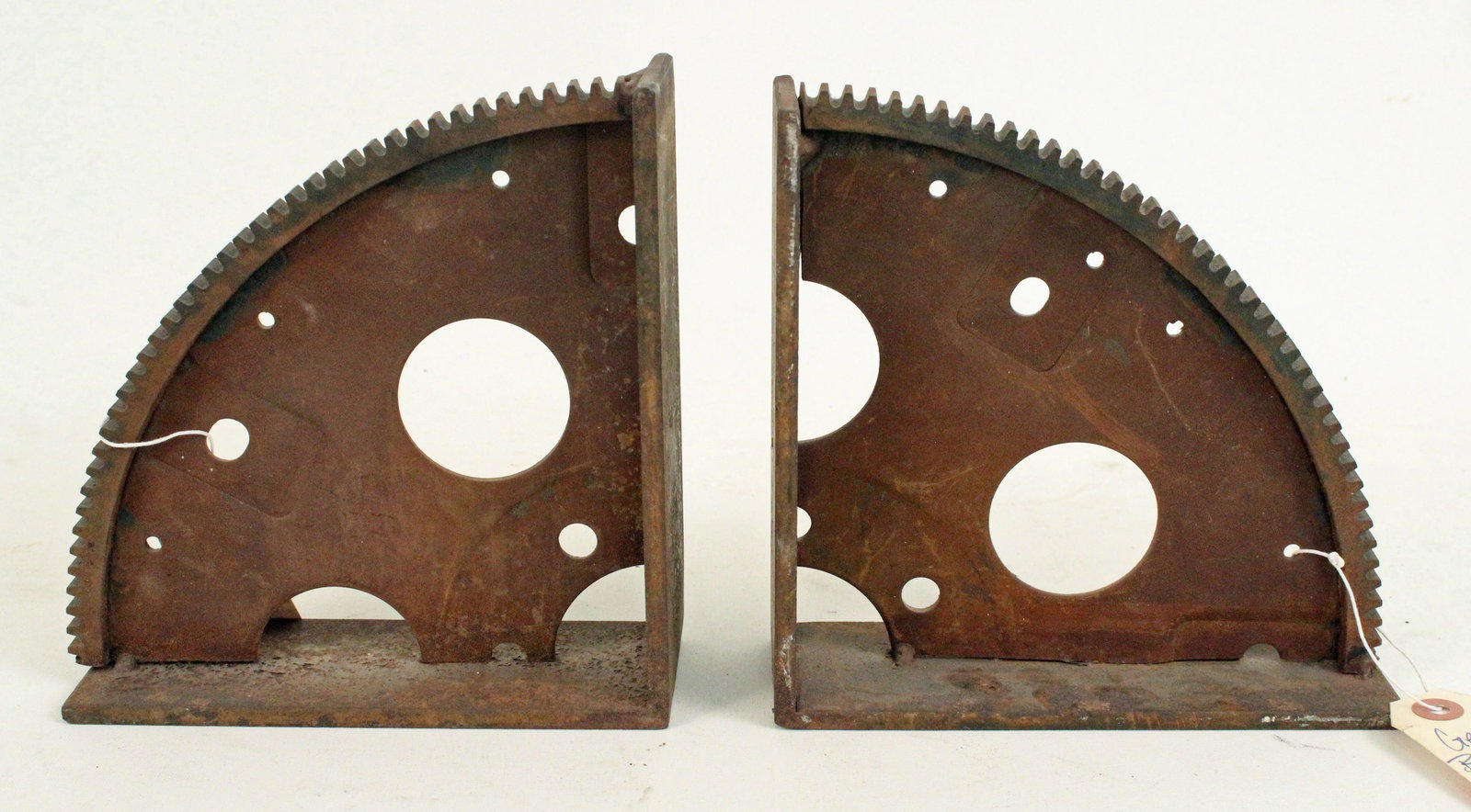 Pair of Custom Gear & Metal Bracket Bookends: Pair of Custom Gear & Metal Bracket Bookends. Measures 7 1/8" high X 2 1/2" wide X 7 3/8" long. Provenance the remaining inventory of Antique Archaeology, closed Nashville, Tennessee location.
