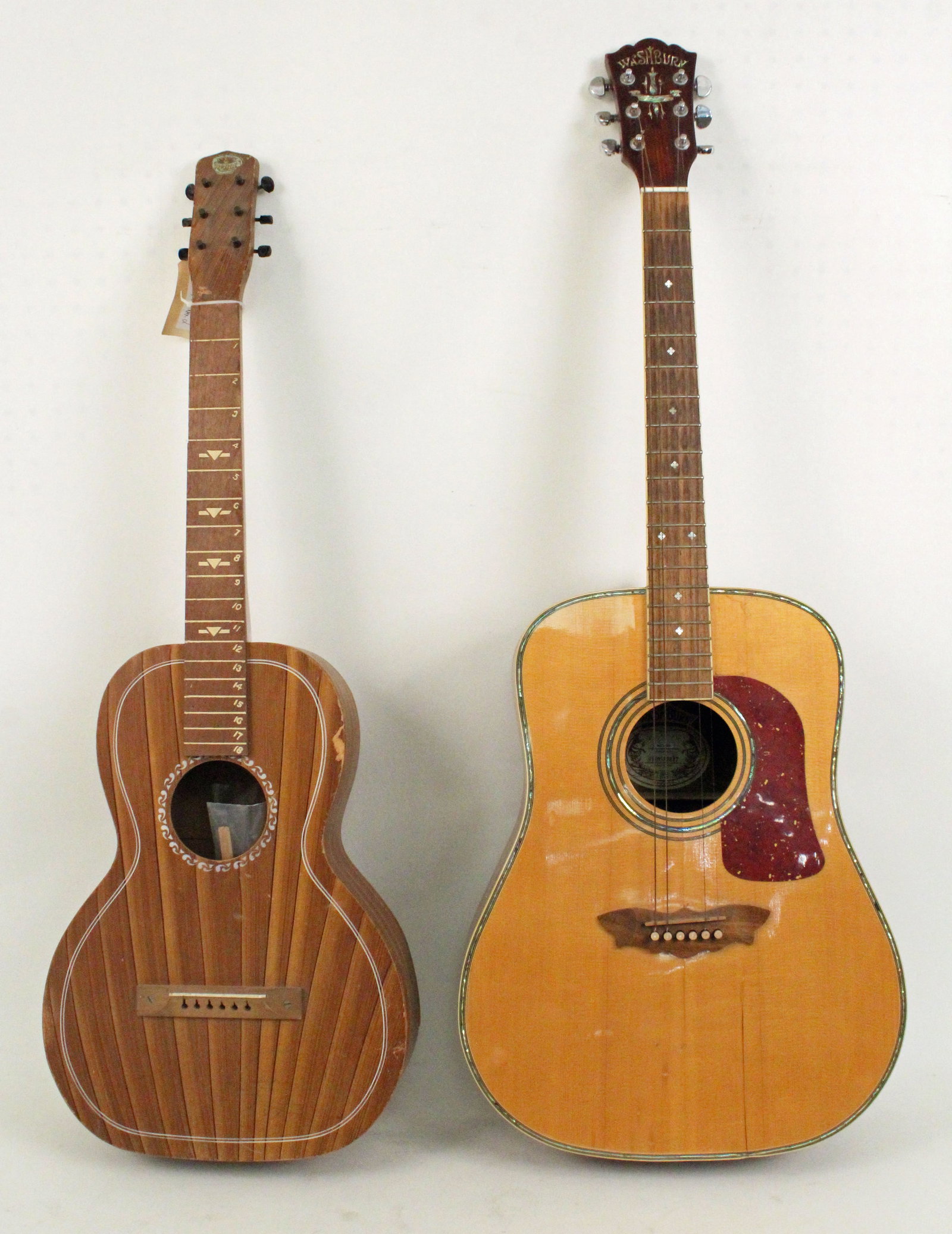 Washburn WD-46S Guitar & Regal Painted Guitar: Washburn WD-46S Guitar and Regal Painted Guitar. (1) Washburn six string guitar with Indian rosewood body and fret board. Mother pearl inlay head with mother pearl face inlaid trim. Measures 41" high 