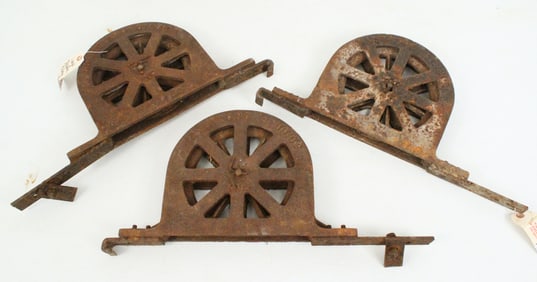 Three Large Cast Iron Theater Pulleys