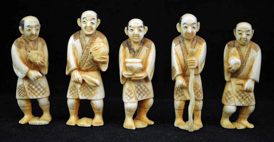 Five Ivory Netsuke Figures "Man with Gifts": Five matching ivory Netsuke figures "Man with Gifts". Four figures bearing gifts and one with staff. Etched calligraphy signature to bases. Measures 2.19" H.