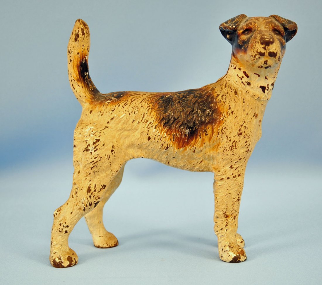 Wirehaired Fox Terrier Dog Cast Iron Doorstop: Wirehaired Fox Terrier Dog Cast Iron Doorstop made by Hubley, cat # 279. Facing right. Dimensions - 8" x 9".